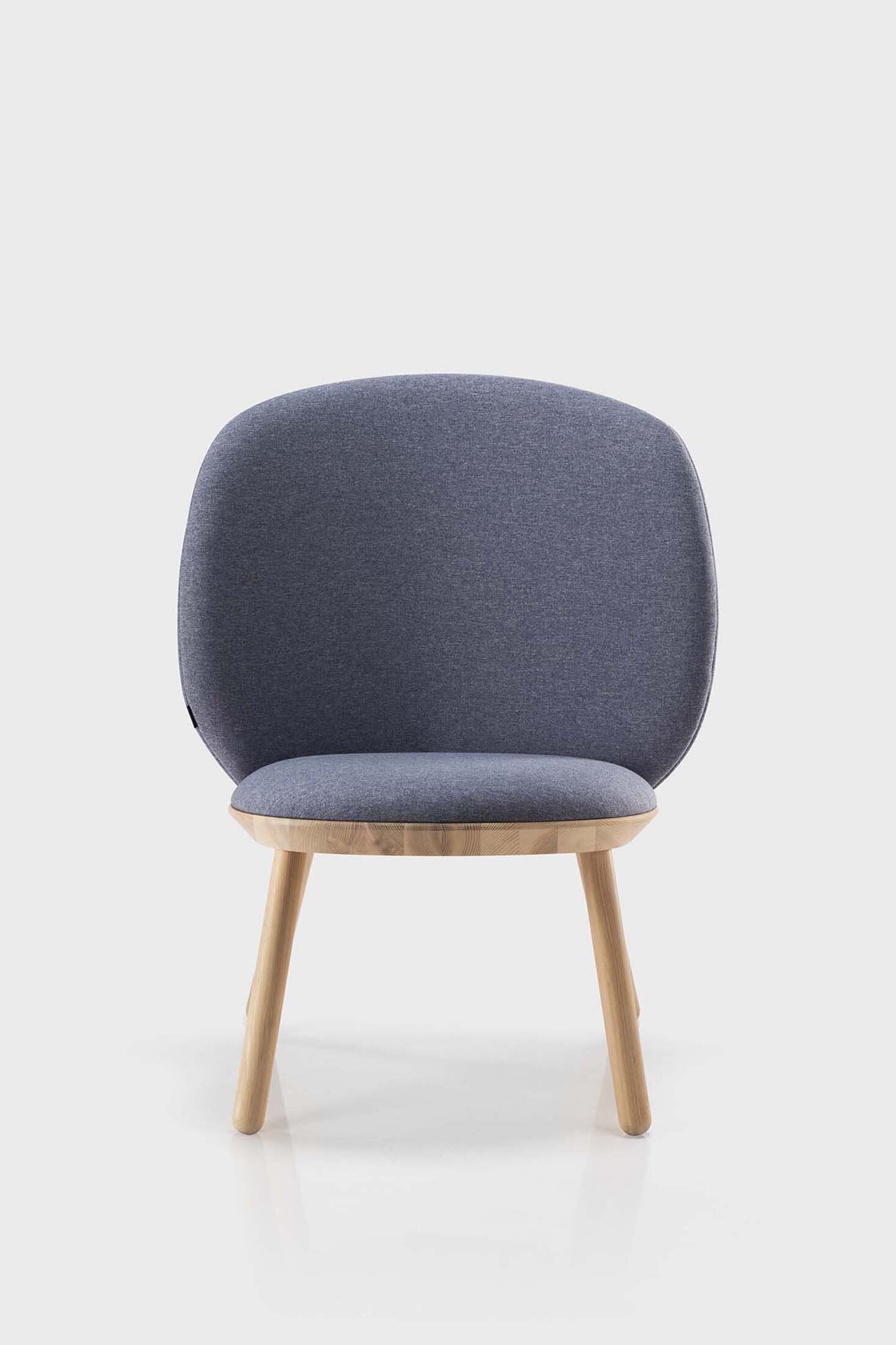 Aquamarine Poppy Naïve Low Chair with light blue fabric and wooden legs, modern furniture design, close-up view of the chair.