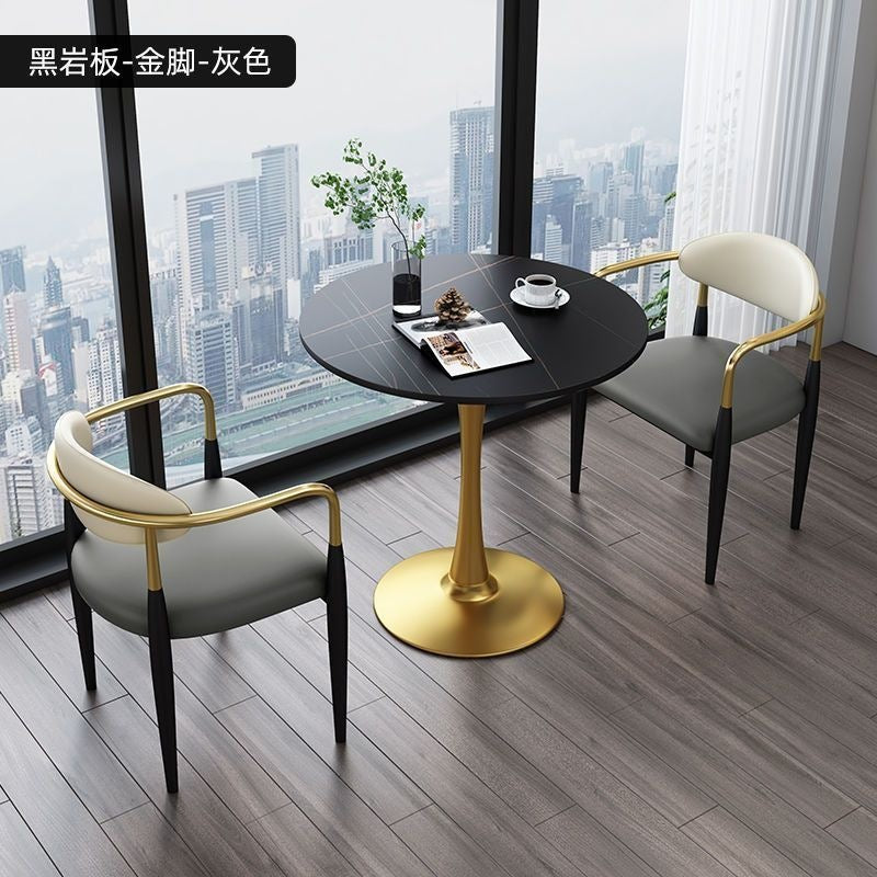 A light luxury sintered stone small round table for reception and negotiation tables and chairs, a trendy coffee table, balcony lounge table, and chair combination
