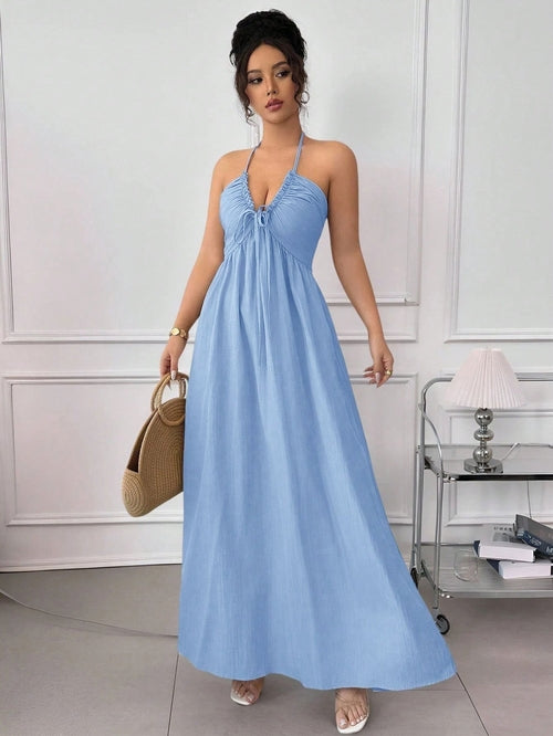 Blue summer halter backless dress with lace-up waist from Pear Daisy, perfect for seaside and warm weather occasions.