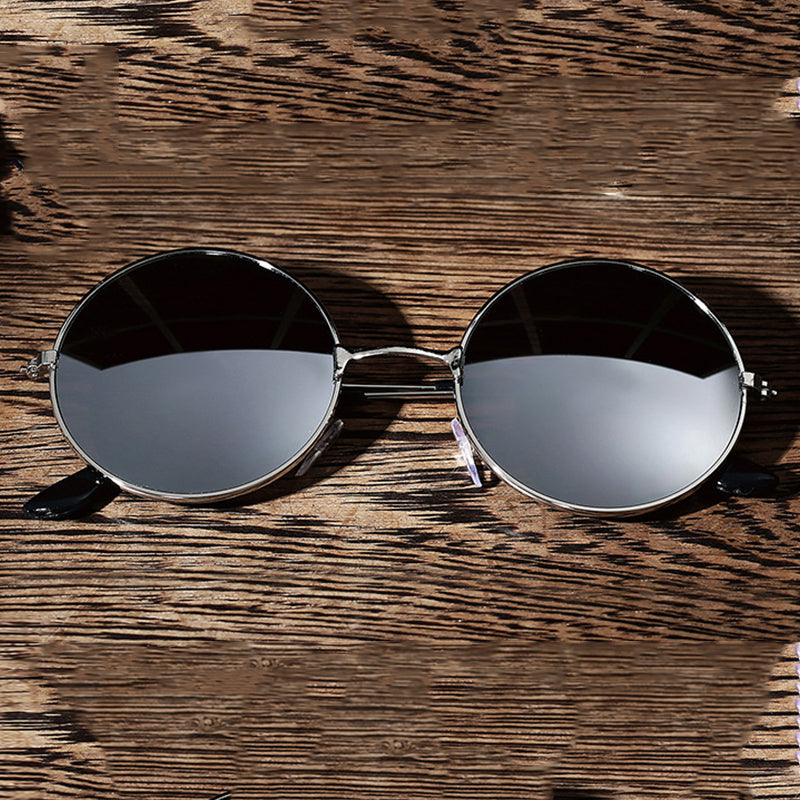 Vintage metal frame sunglasses by Teal Simba featuring classic design and dark tinted lenses.