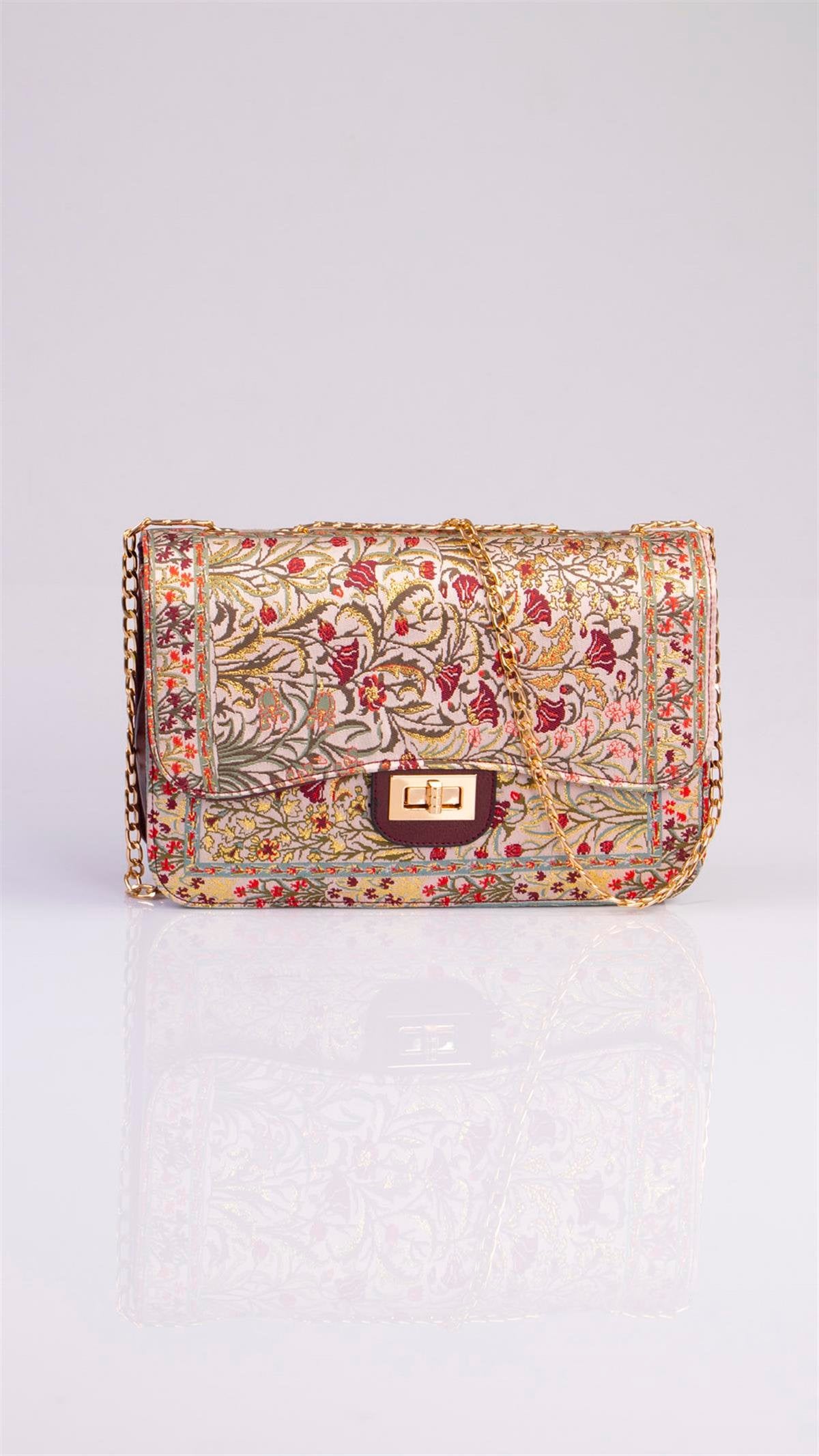 Colorful handmade Oriental handbag by Chocolate Eros featuring floral patterns, stylish design, and multicolor accents.