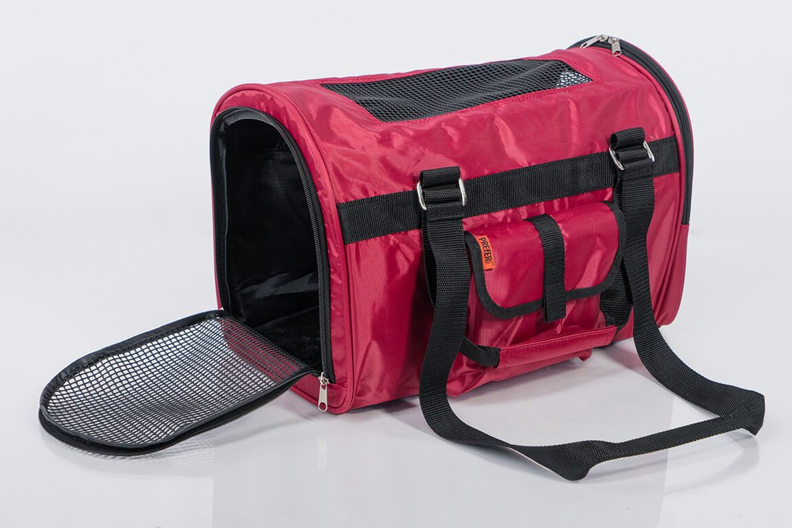 Pink Coconut 566 Jet Carrier pet carrier in burgundy, shown open with side view for secure transport of small pets.