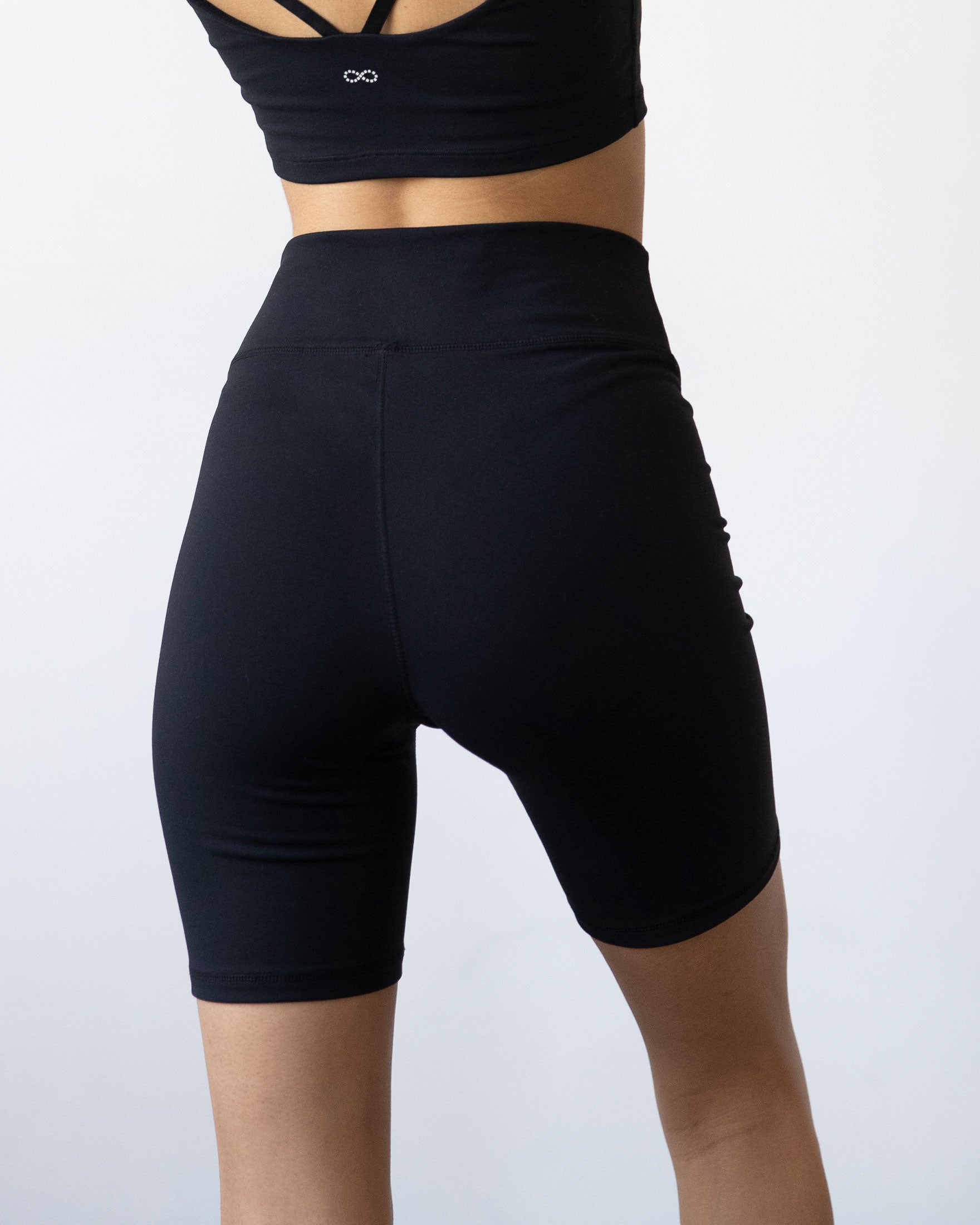 Black Lemon Molly Vendetta Biker Shorts 7-inch length, back view, stylish women&
