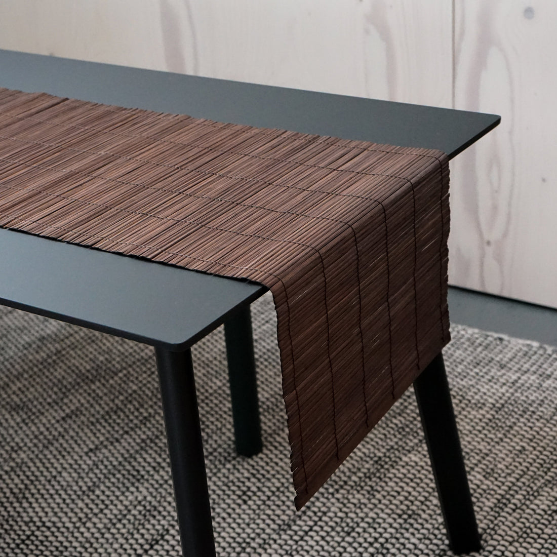 Bamboo table runner by Orchid Daisy, natural-colored fabric with a smooth texture, spread on a wooden dining table for home decor.