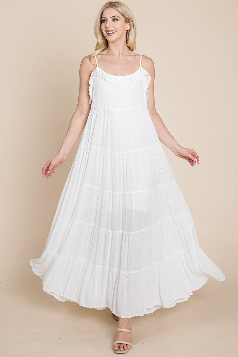 Cream tiered tie strap cami maxi dress by Aquamarine Gaia, featuring flowy fabric and adjustable straps in a women&