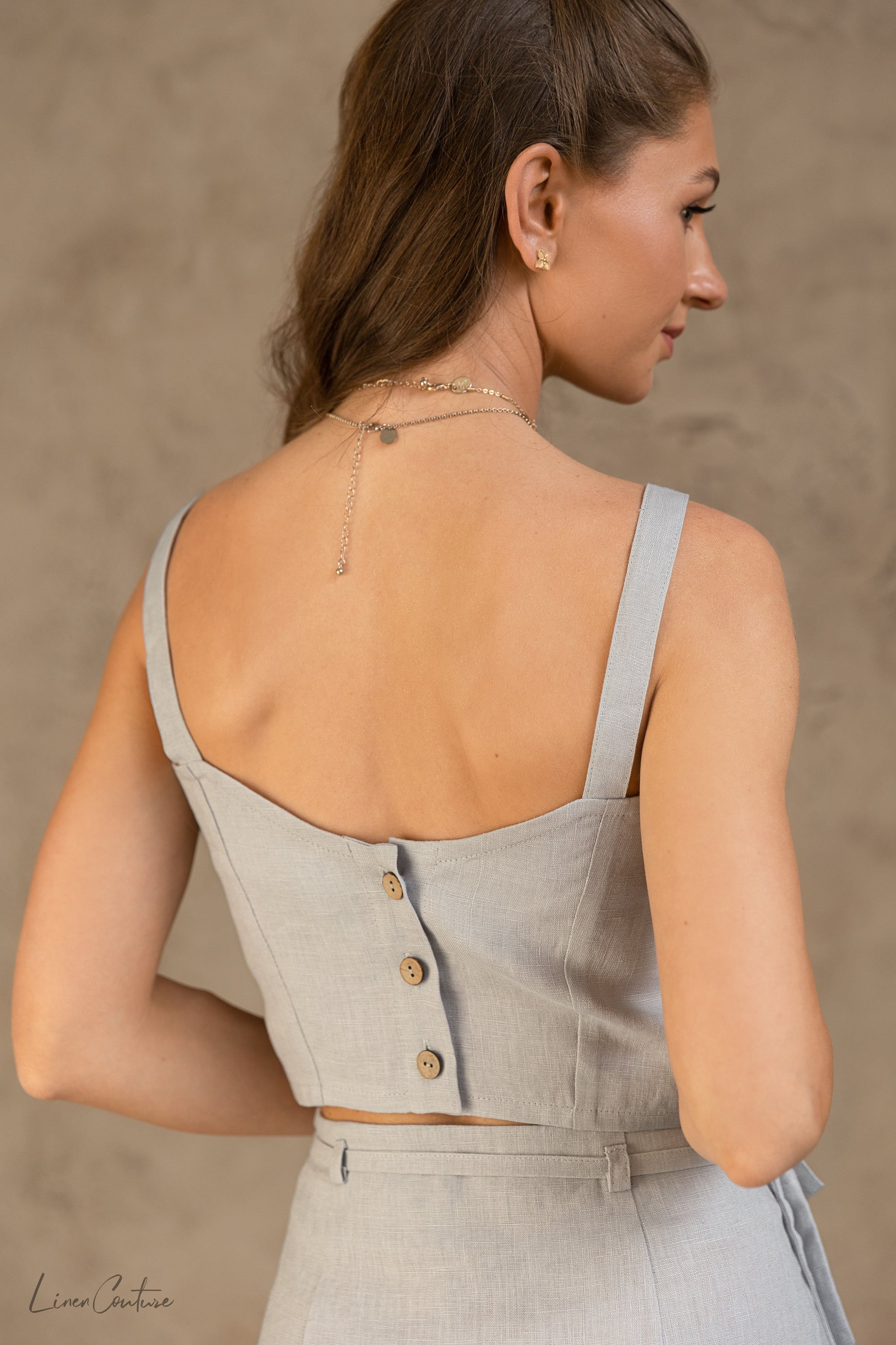 Light grey linen crop top and midi skirt set by Magenta Sugarplum, stylish Bella Vita matching set for casual and chic looks.