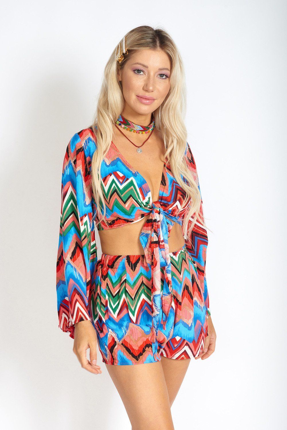 Rainbow Waves Bohemian front tying crop top for women, featuring vibrant rainbow waves and relaxed bohemian style.