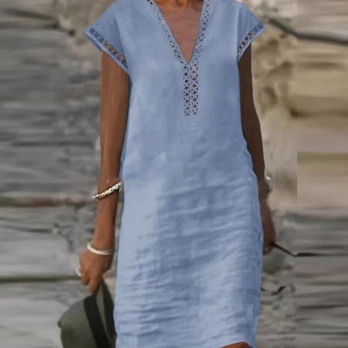 Elegant cotton linen dress from Yellow Eleusis, showcased in a stylish fashion display.