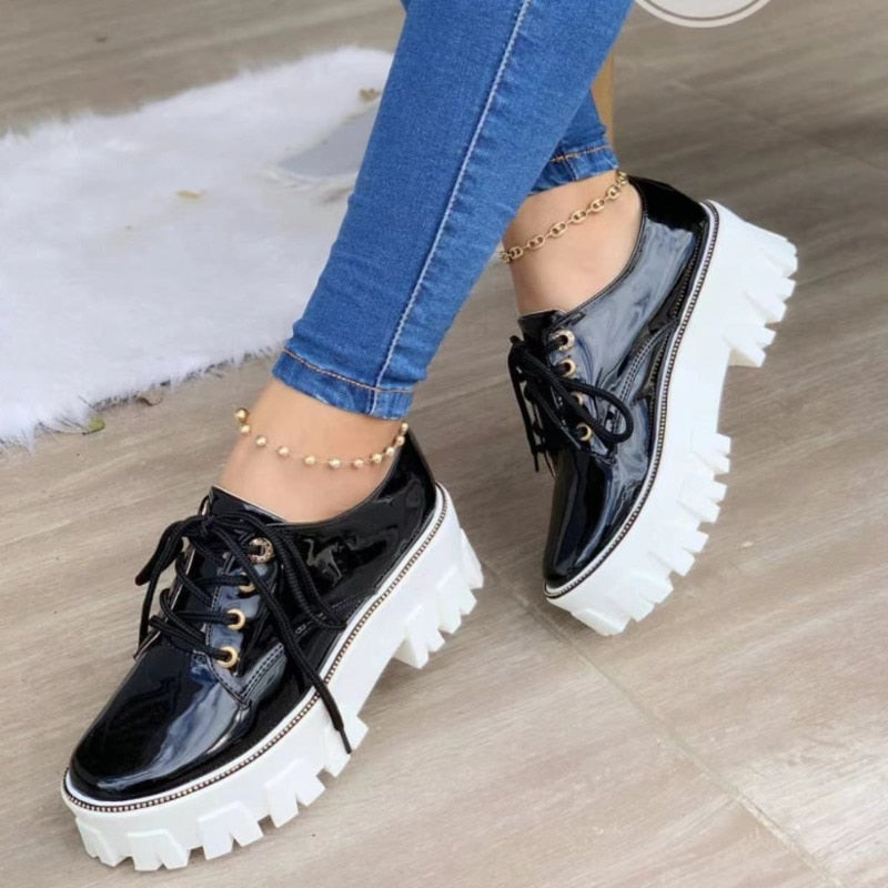 Black, red, and pink thick heel flat platform oxford shoes for women by Coffee Jasper, featuring a stylish sneaker-inspired design.