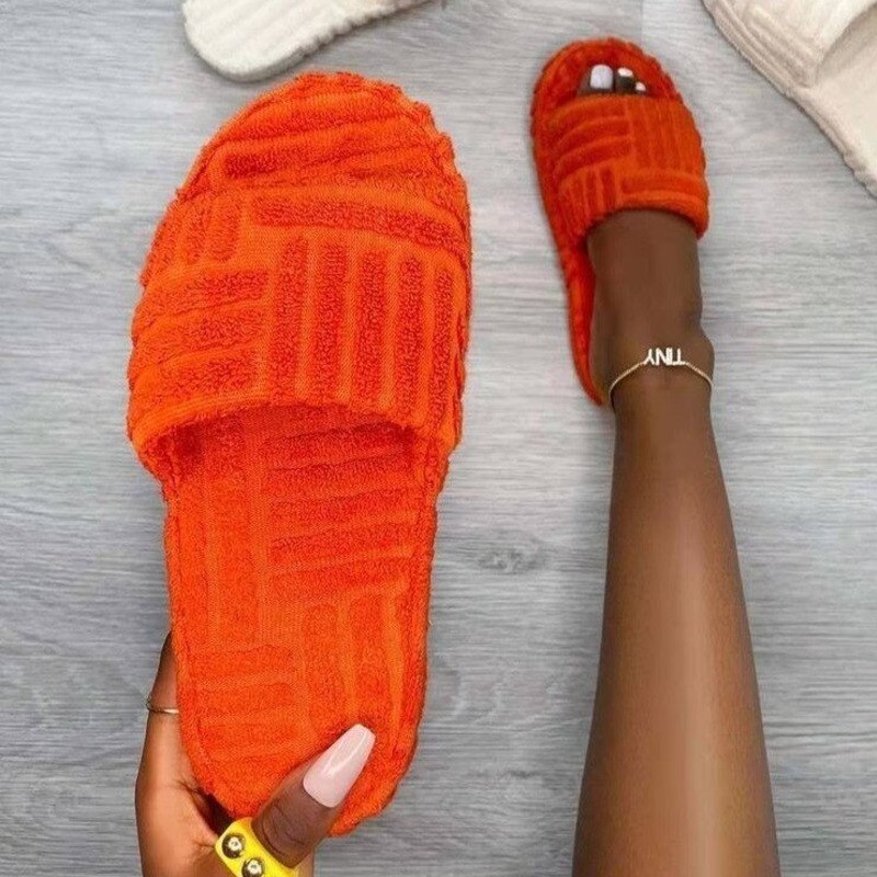 Red Iphigenia thick bottom embossed cotton fur women’s slippers with plush interior and stylish textured design.