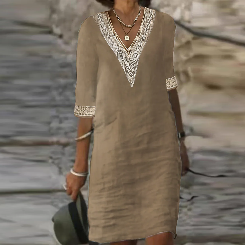 Elegant cotton linen dress from Yellow Eleusis, featuring a stylish and lightweight design perfect for warm weather.