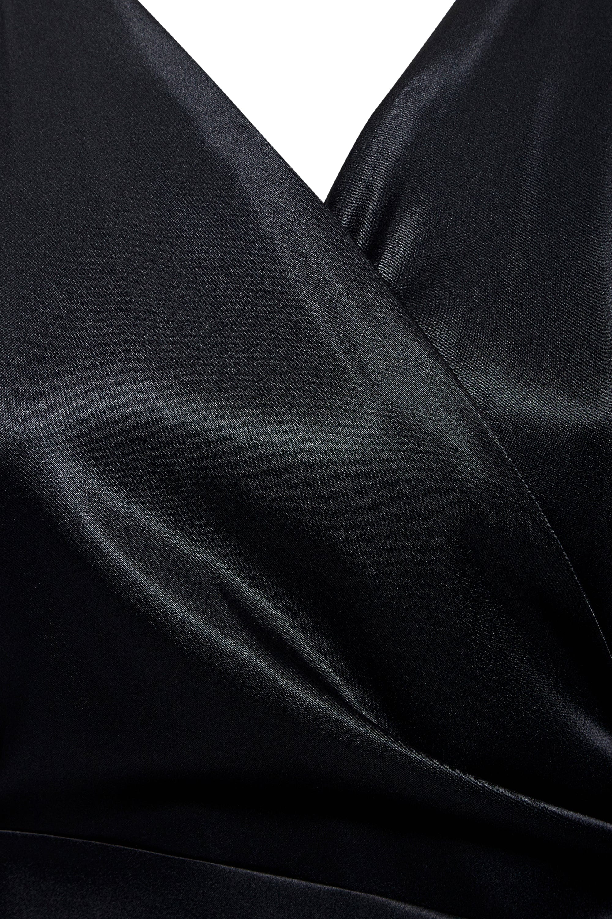 Black wrap maxi dress by Blush Athena, featuring a flowing silhouette and elegant design, perfect for formal occasions.