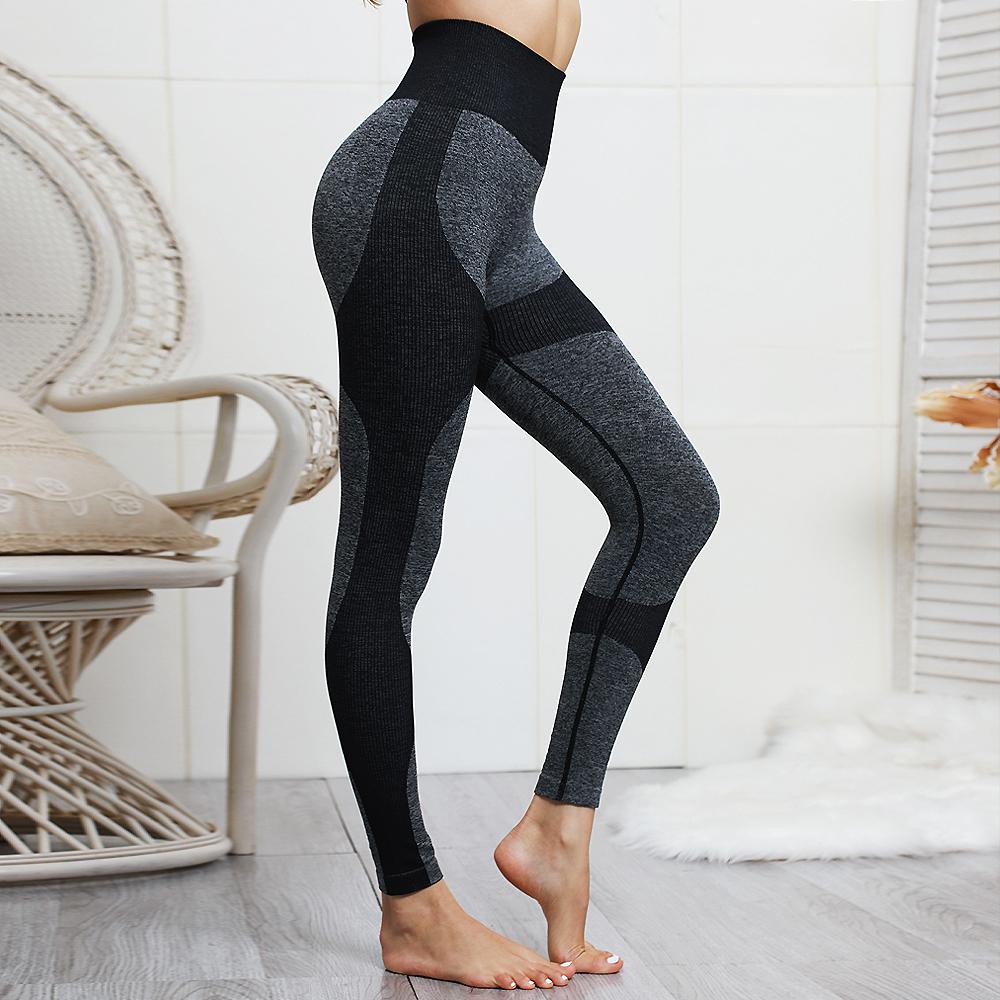 Black high waist seamless yoga leggings and stretch sports bra from Amethyst Hera activewear set, ideal for yoga and workouts.