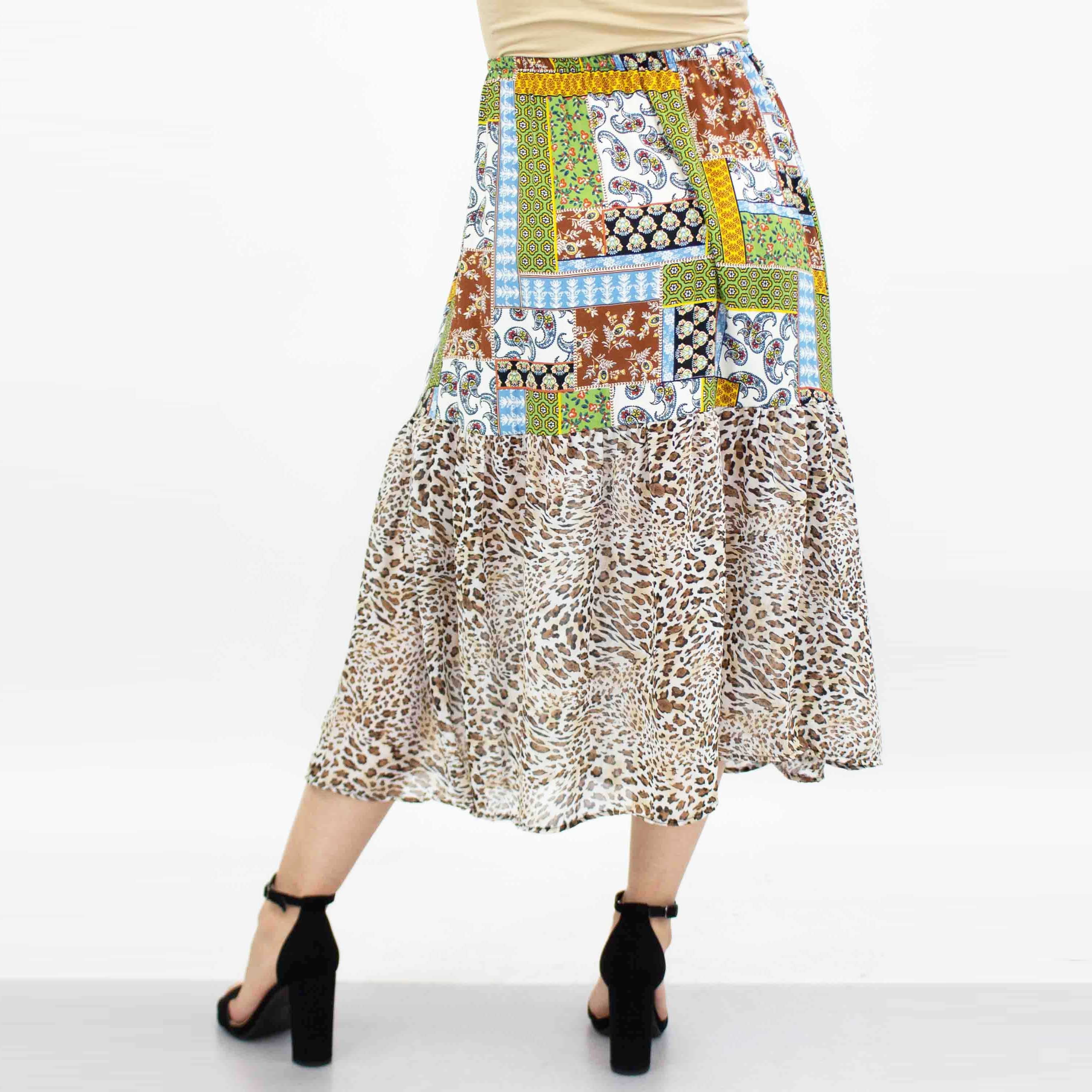 Green animal print color block skirt from Yellow Hera, featuring bold patterns and vibrant fabric for stylish casual wear.