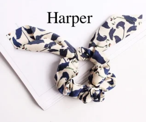 Green Athena chiffon hair scrunchie, soft and lightweight accessory with ruffled fabric for stylish hair styling.