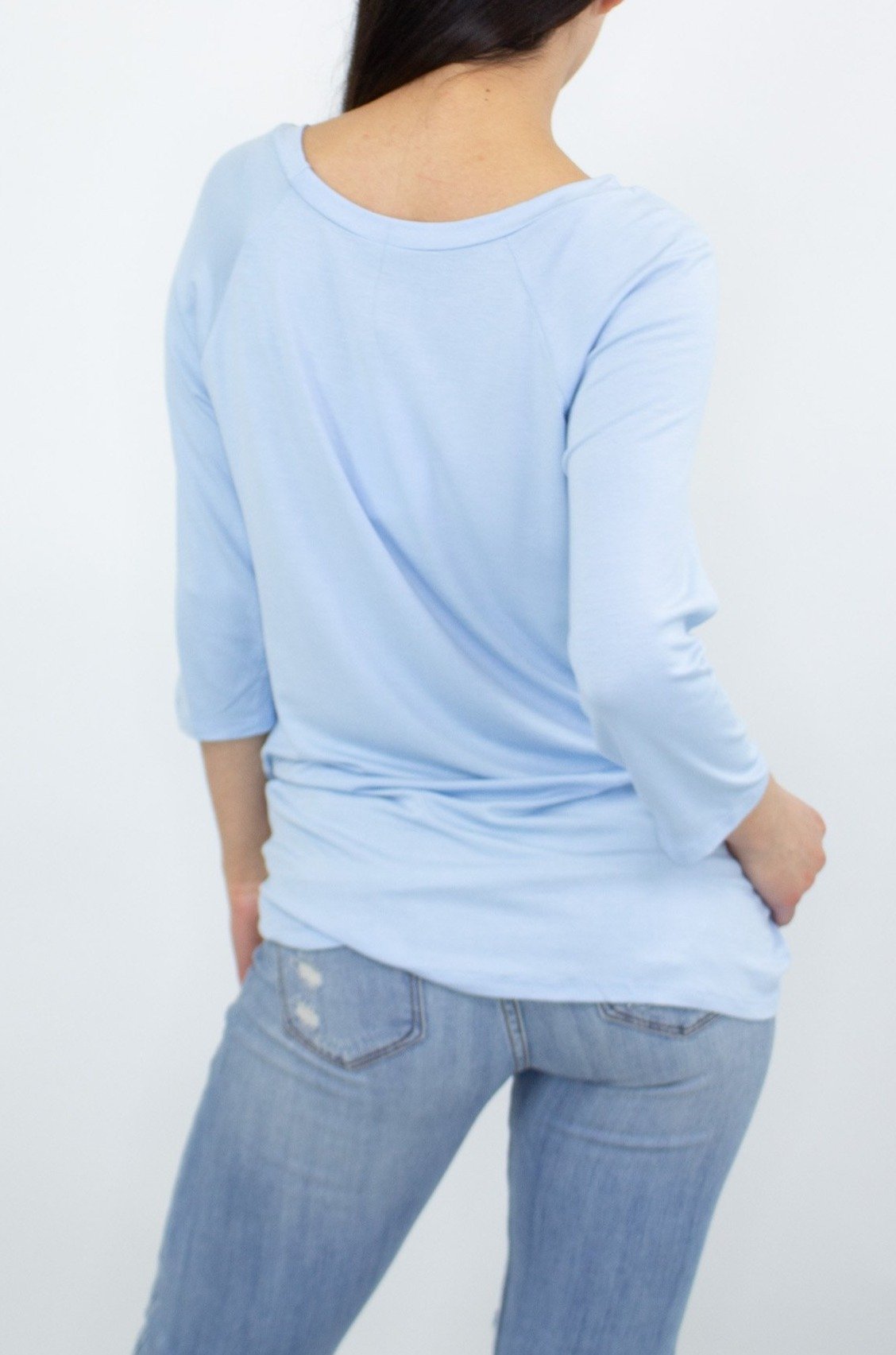 Blue twisted front comfortable top by Yellow Hera, featuring a stylish design and soft fabric, ideal for casual wear.