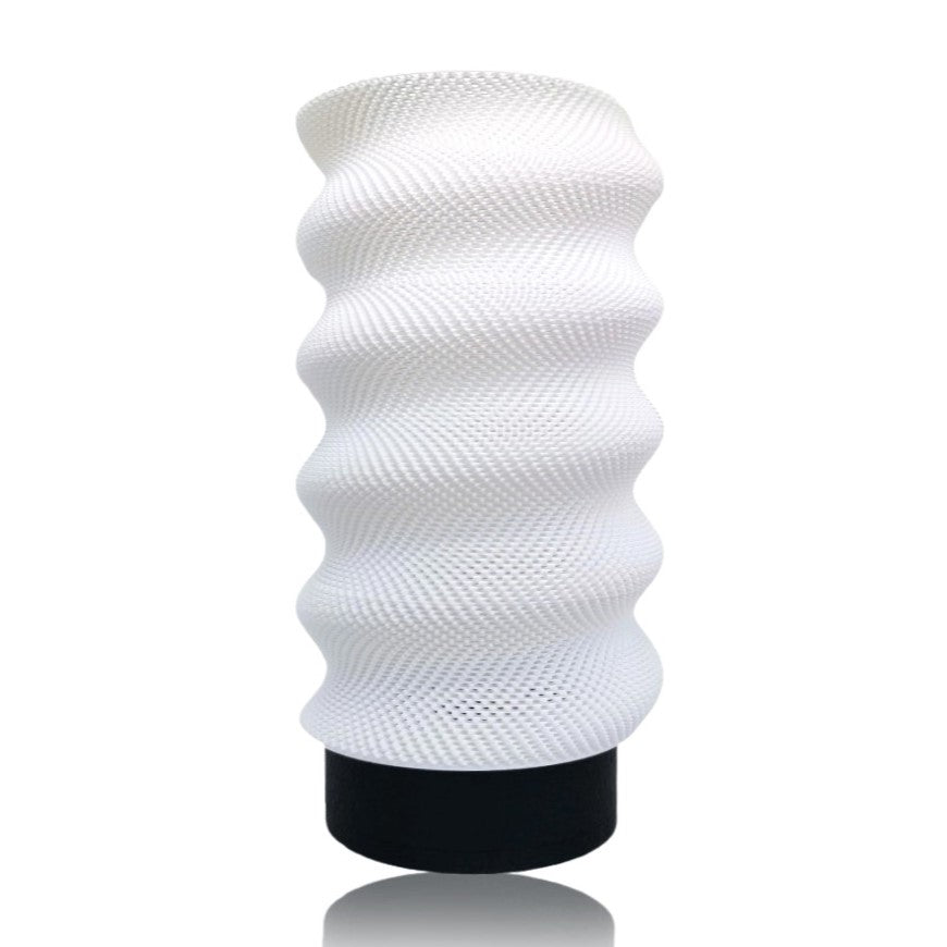 Black Lumina Twist portable table lamp by Azure Pontus with a sleek, modern design perfect for ambient lighting.