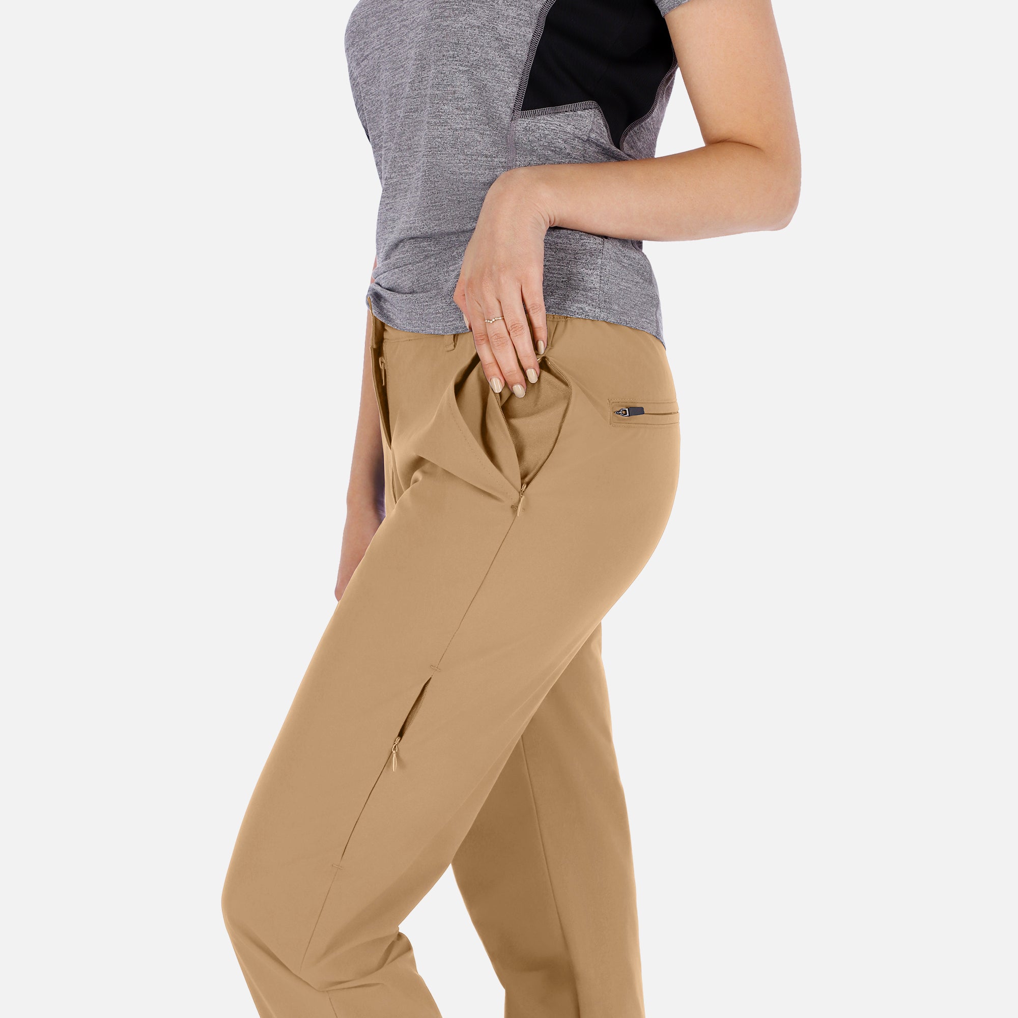 Women’s beige adventure pants by Rose Hemera, long activewear trousers with a comfortable fit and functional design.