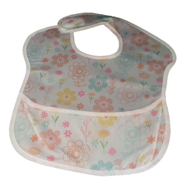 Waterproof baby bib with crumb catcher in yellow, pink, and blue floral jeans design by Raspberry Pallas.