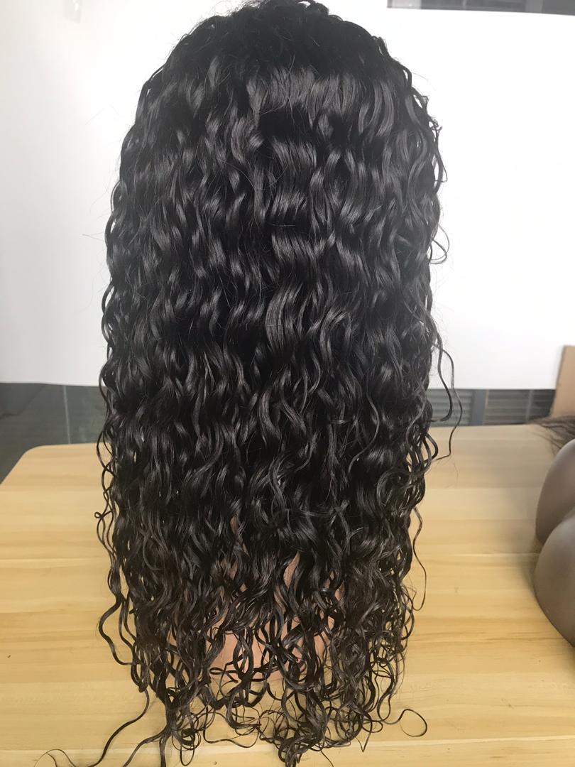 Cerise Alfie BeuMax Brazilian 13x4 water wave lace front human hair wig with natural-looking water waves and lace front detail.