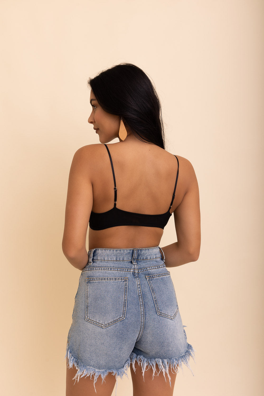 Black sheer mesh basic bralette by Periwinkle Aether, showing its delicate fabric and comfortable fit.