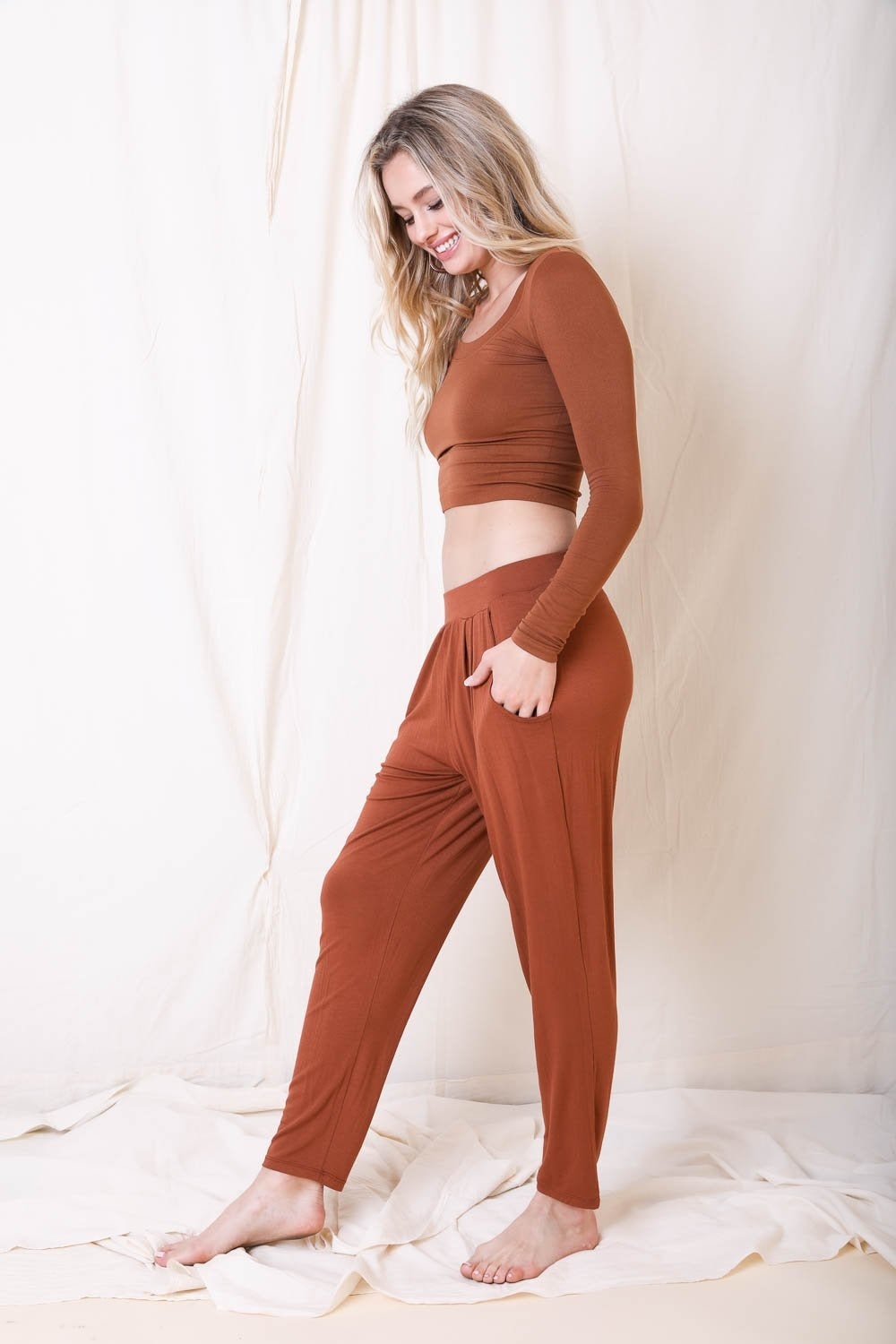 Periwinkle Aether wide band lounge pants in copper color, featuring a comfortable fit and relaxed style.