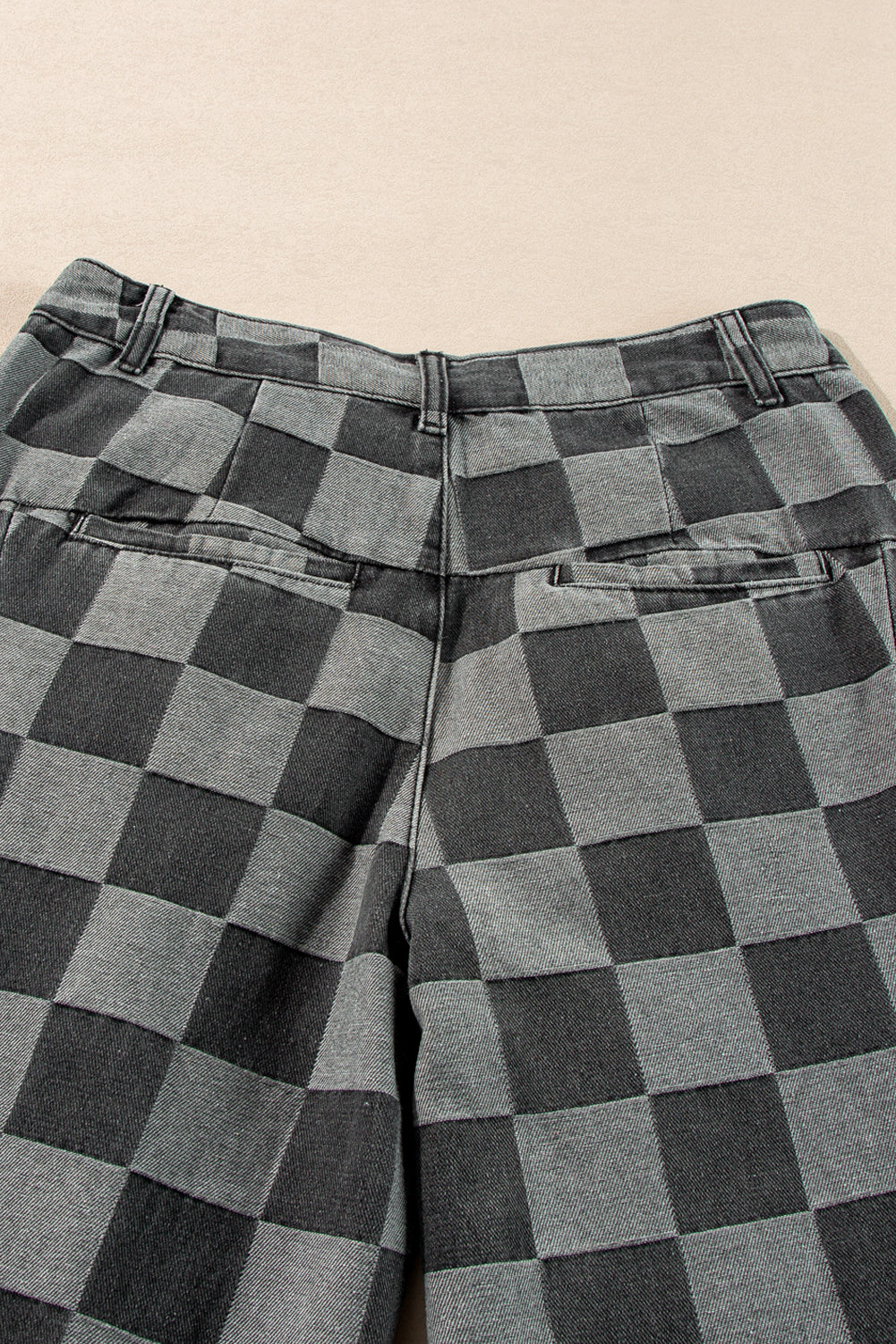 Dark grey checkered denim wide leg jeans for women by Ruby Styx, showcasing the relaxed fit and stylish checkered pattern.