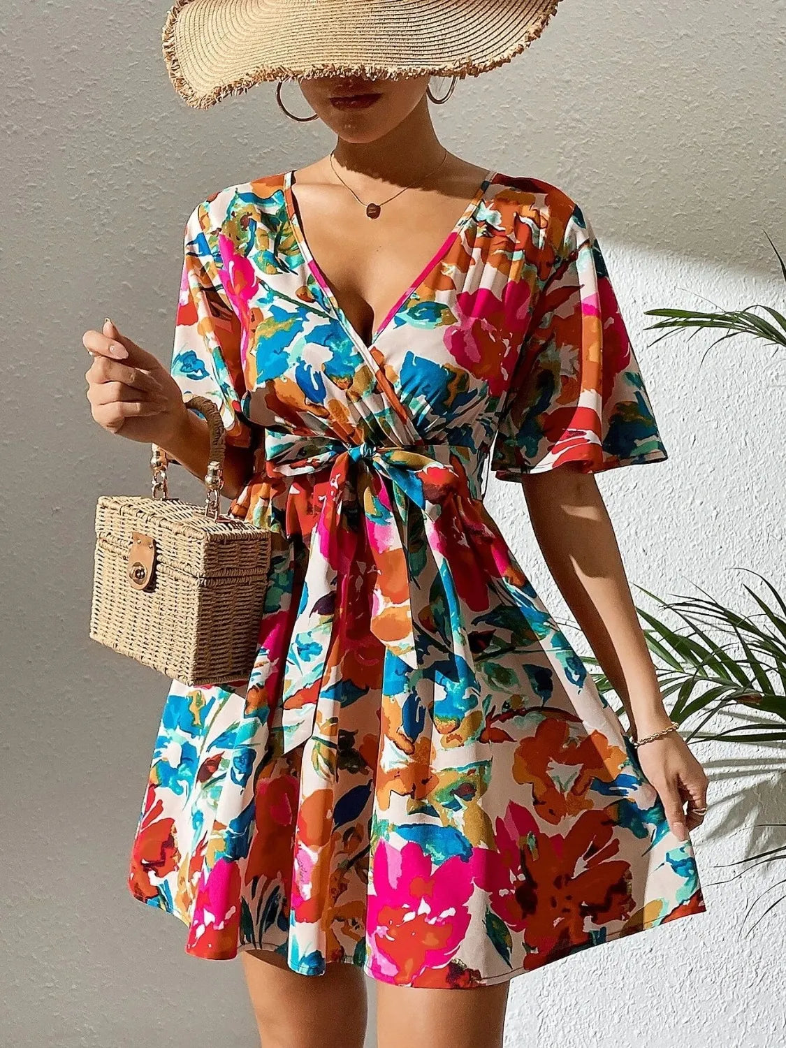 Printed surplice short sleeve mini dress for women by Ruby Styx, featuring a stylish design and flattering fit.
