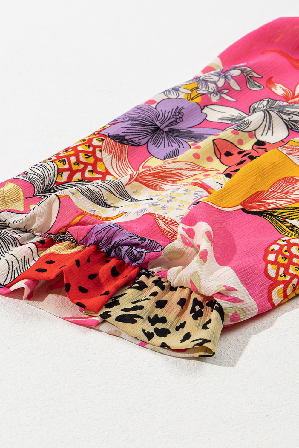 Red floral print blouse with ruffled bubble sleeves and button-up front from Carmine Juneberry&