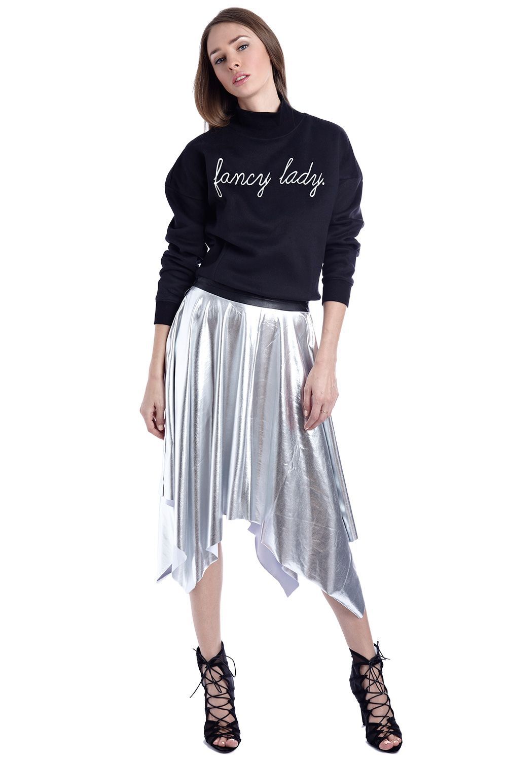 Silver metallic pleated midi skirt by Erin Theia, showcasing shiny fabric and elegant pleats for stylish accessories.