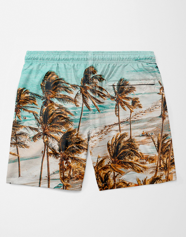 Sky Felix beach shorts with a vibrant print, displayed on a model, perfect for casual summer beachwear.