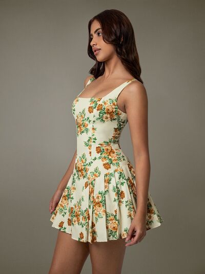 Taupe Oliver floral sleeveless mini pleated dress, stylish T-shirt with vibrant floral pattern and lightweight fabric.