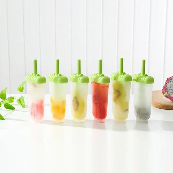 Six reusable Pear Daisy popsicle molds for making homemade ice cream and ice pops in a home and garden setting.