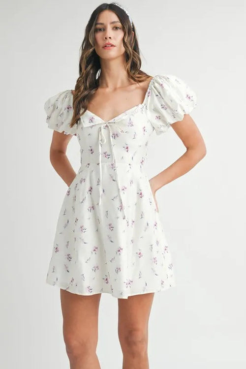 Pear Daisy floral print puff sleeve mini dress with a feminine design, perfect for summer or garden events.