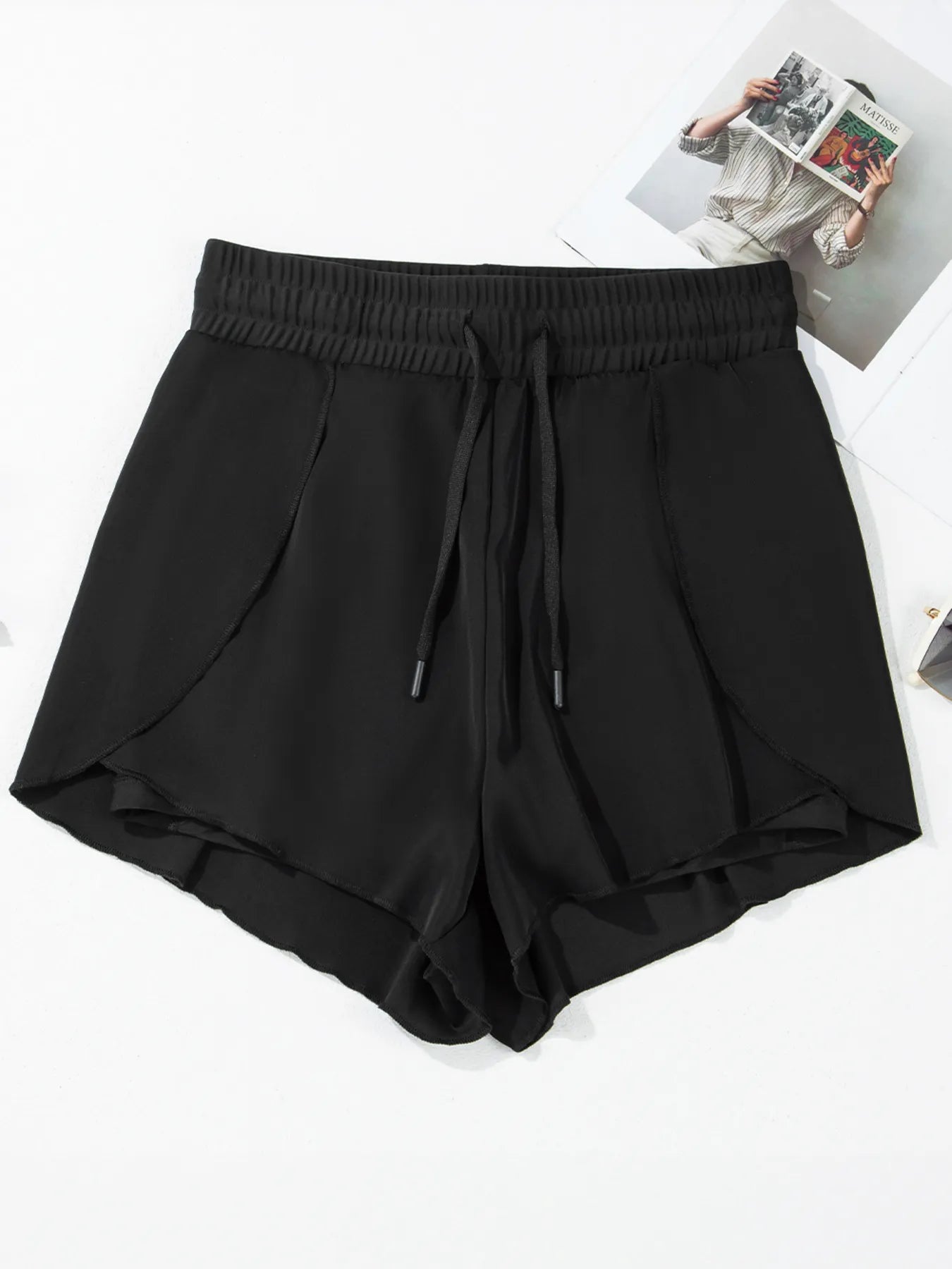 Pear Daisy high waisted drawstring swim shorts with a relaxed fit, suitable for beach or poolside lounging.