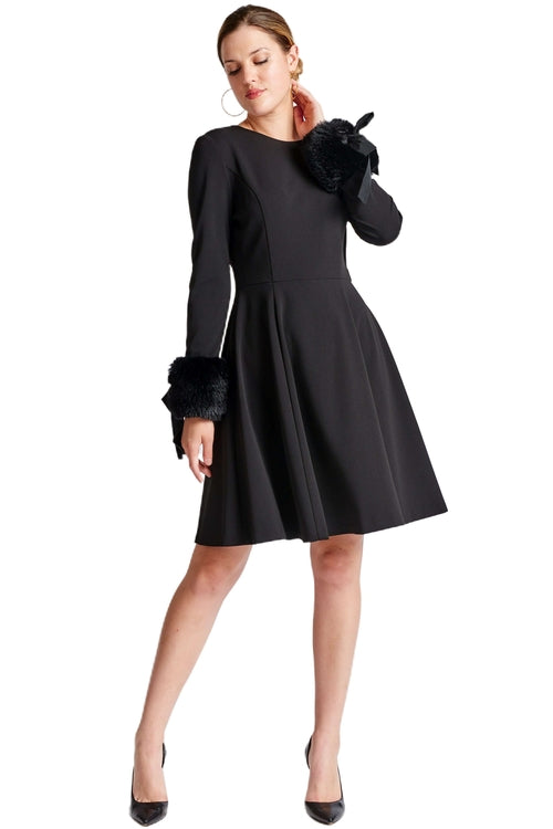 Peach Dionysus Caroline Dress featuring long sleeves, fit and flare silhouette, black fabric, and faux fur cuffs.