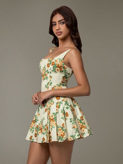 Taupe Oliver floral sleeveless mini pleated dress, lightweight T-shirt style with vibrant floral patterns on soft fabric.