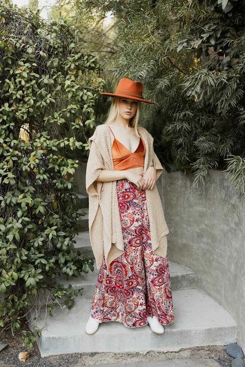 Beige cozy soft waffle hooded ruana by Periwinkle Aether, featuring a warm, relaxed fit and a stylish hood for comfort and style.