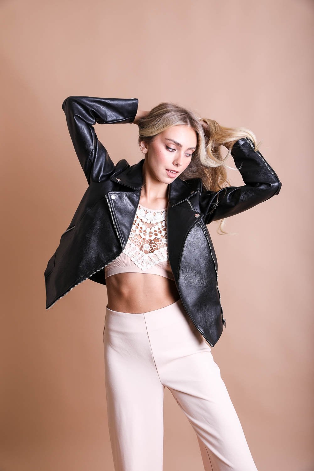 Crochet lace high neck bralette by Periwinkle Aether, halter style with cross-back design, showcasing intricate lace details.