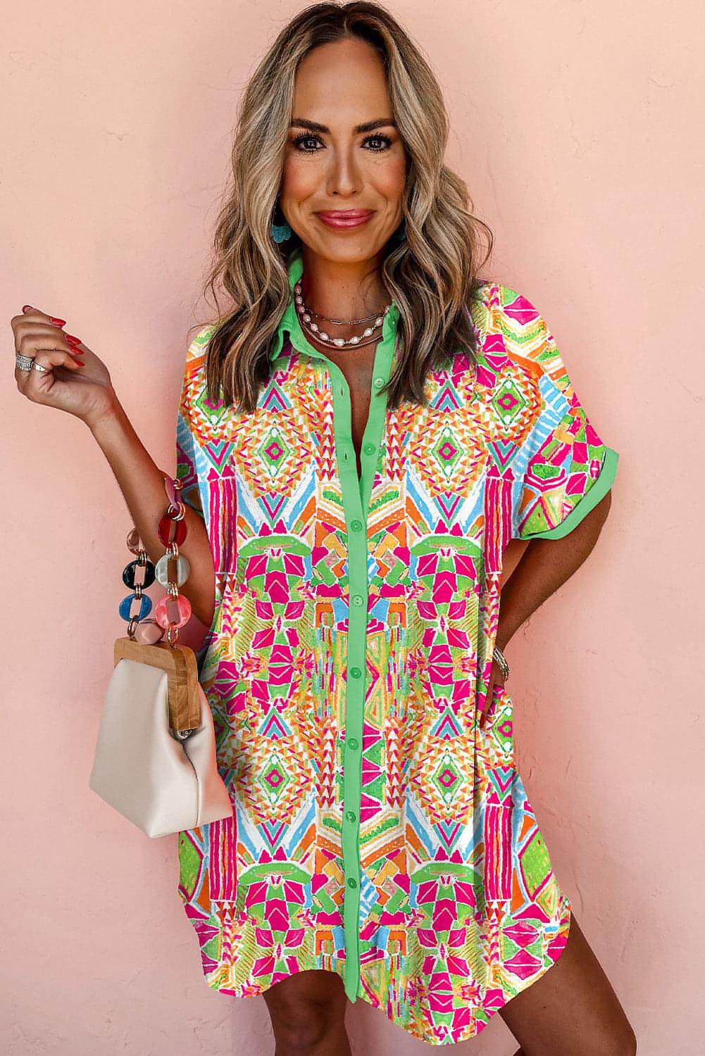 Orange geometric print contrast short sleeve dress by Carmine Juneberry, stylish dress with vibrant pattern and relaxed fit.