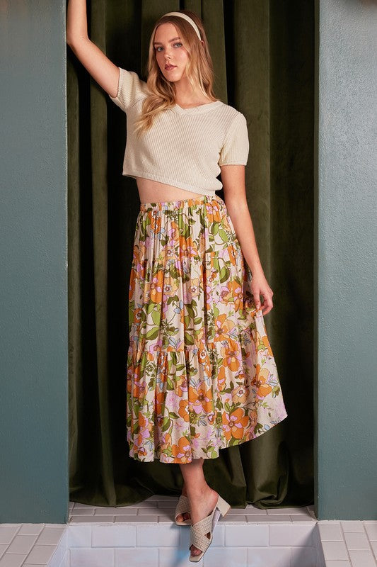 Colorful flower print elastic waist tiered skirt by Jade Icarus, featuring a flowing, layered design perfect for casual wear.