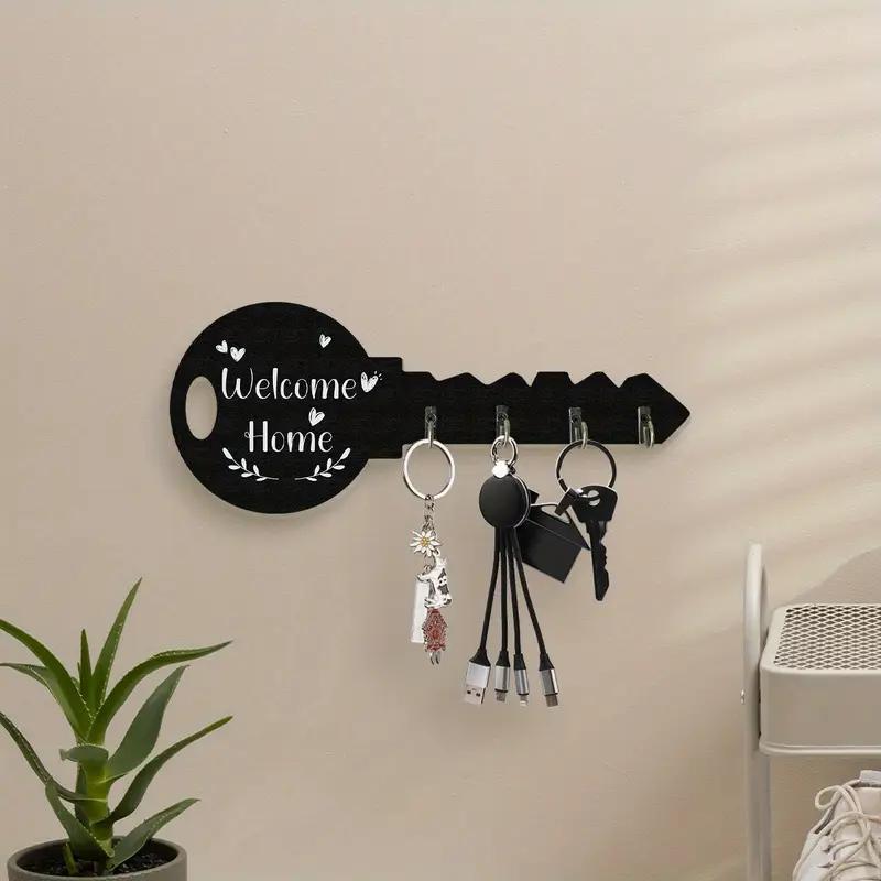 Vintage wooden key-shaped wall hook from Pear Daisy, decorative home and garden key hook for hanging items.