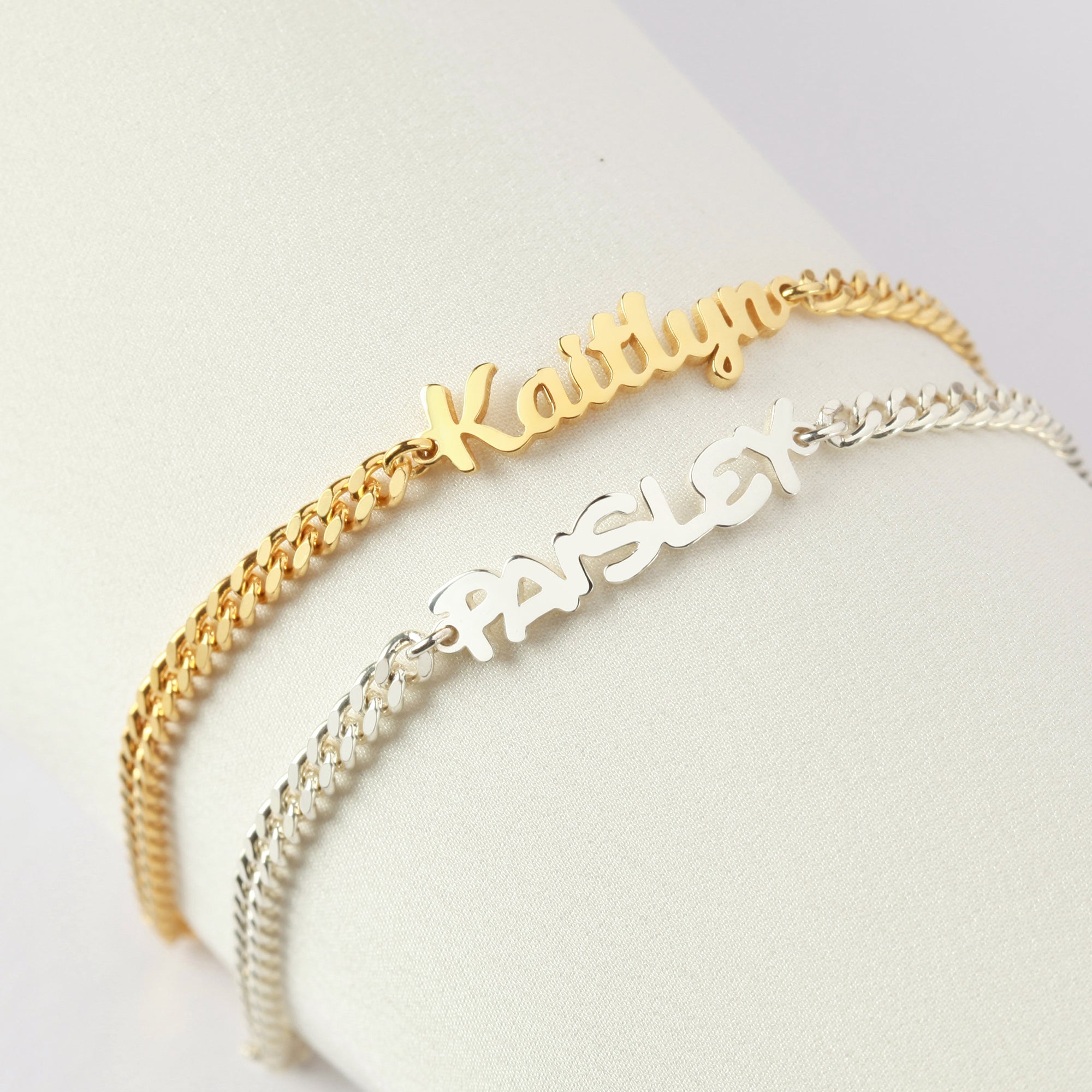 Child name bracelet by Green Millie featuring a delicate baby girl jewelry design with customizable name charm.