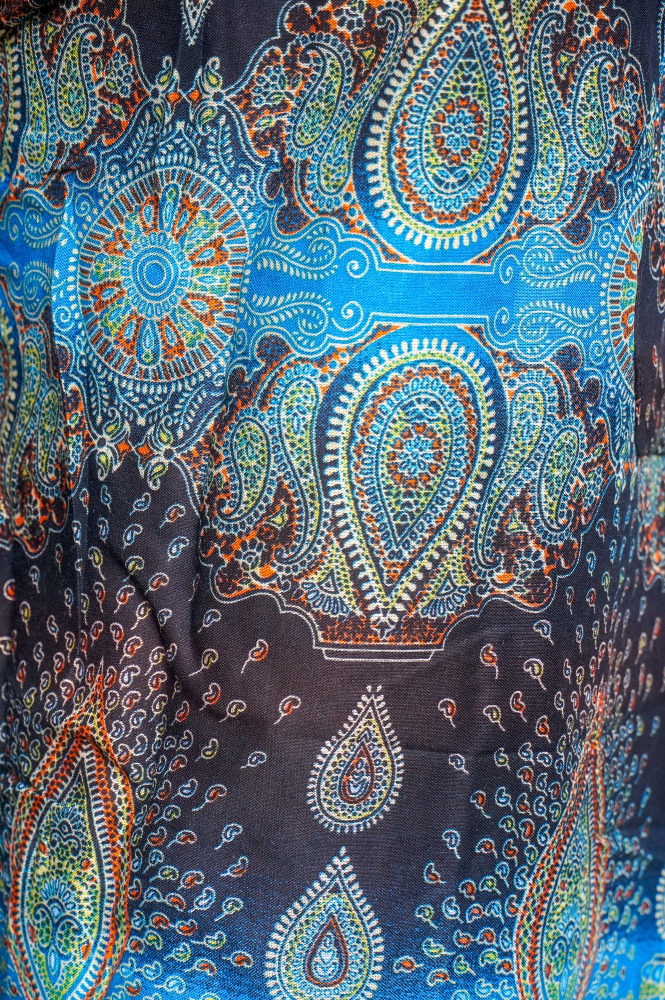 Turquoise paisley harem pants with boho style, loose fit, and hippie-inspired design by Tan Smokey.