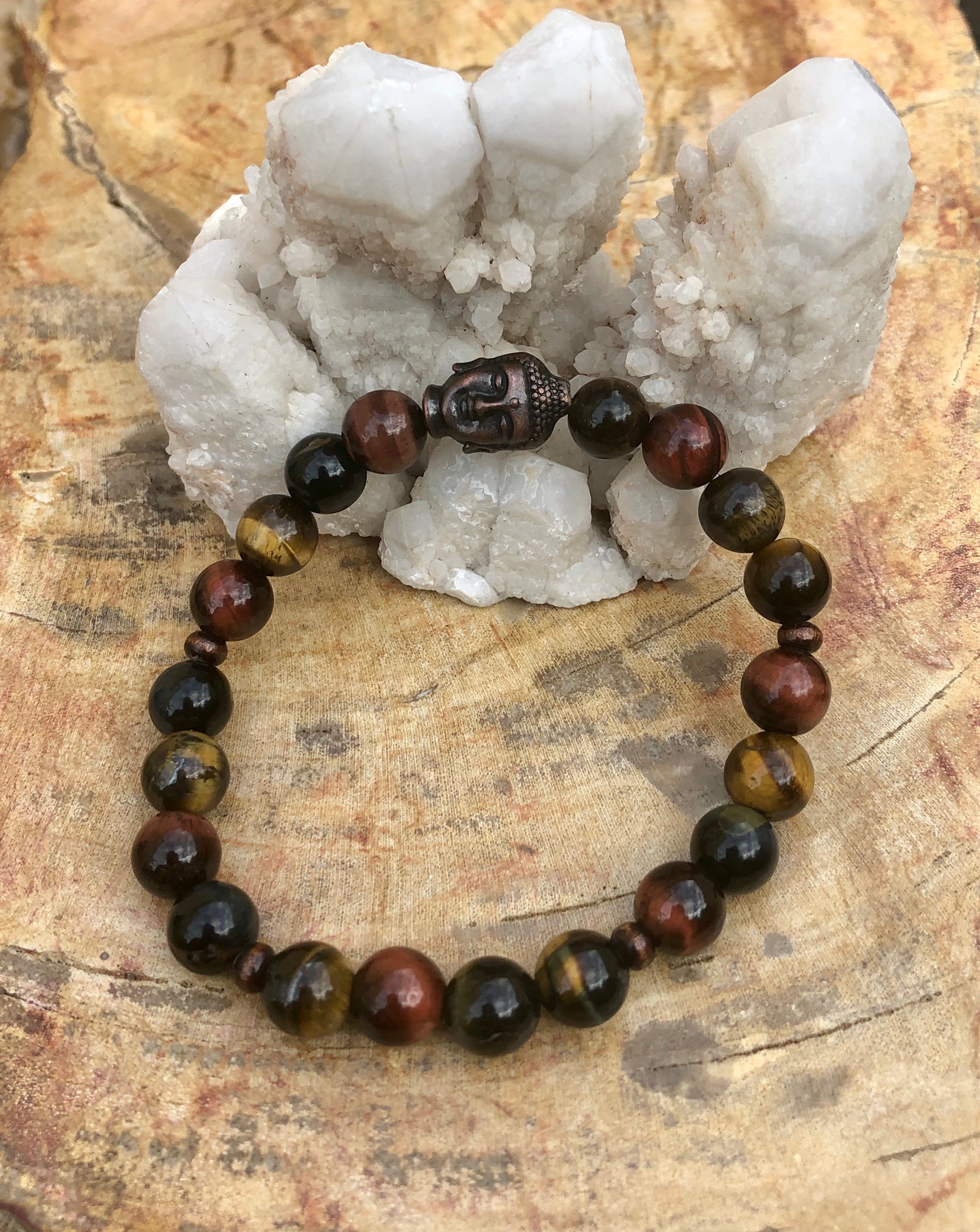 Violet Chaos multi tiger eye and Buddha gemstone stretch bracelet featuring polished beads and a Buddha charm.