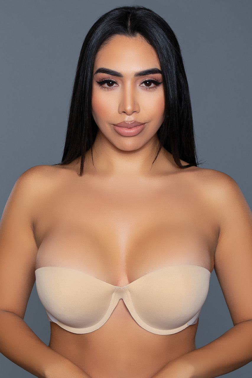 Magenta Caeneus strapless adhesive bra worn under a sleeveless top, showcasing seamless, skin-tone lingerie for backless outfits.