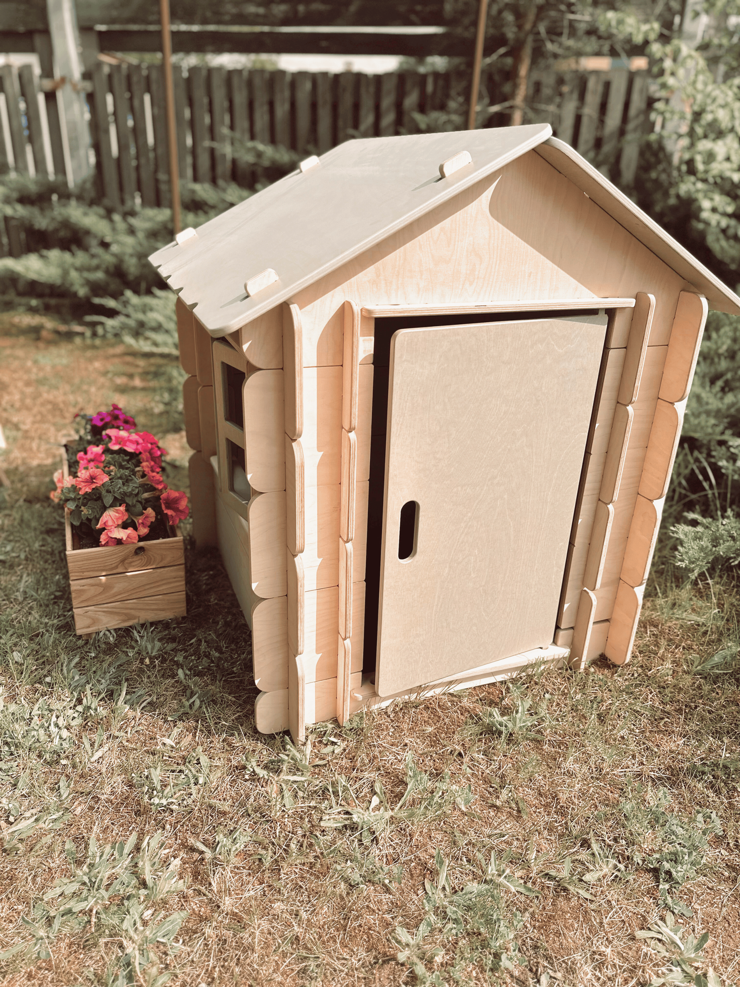Lavender Arachne Little Bunny Playhouse for kids, colorful wooden furniture with bunny-shaped windows and a cozy design.