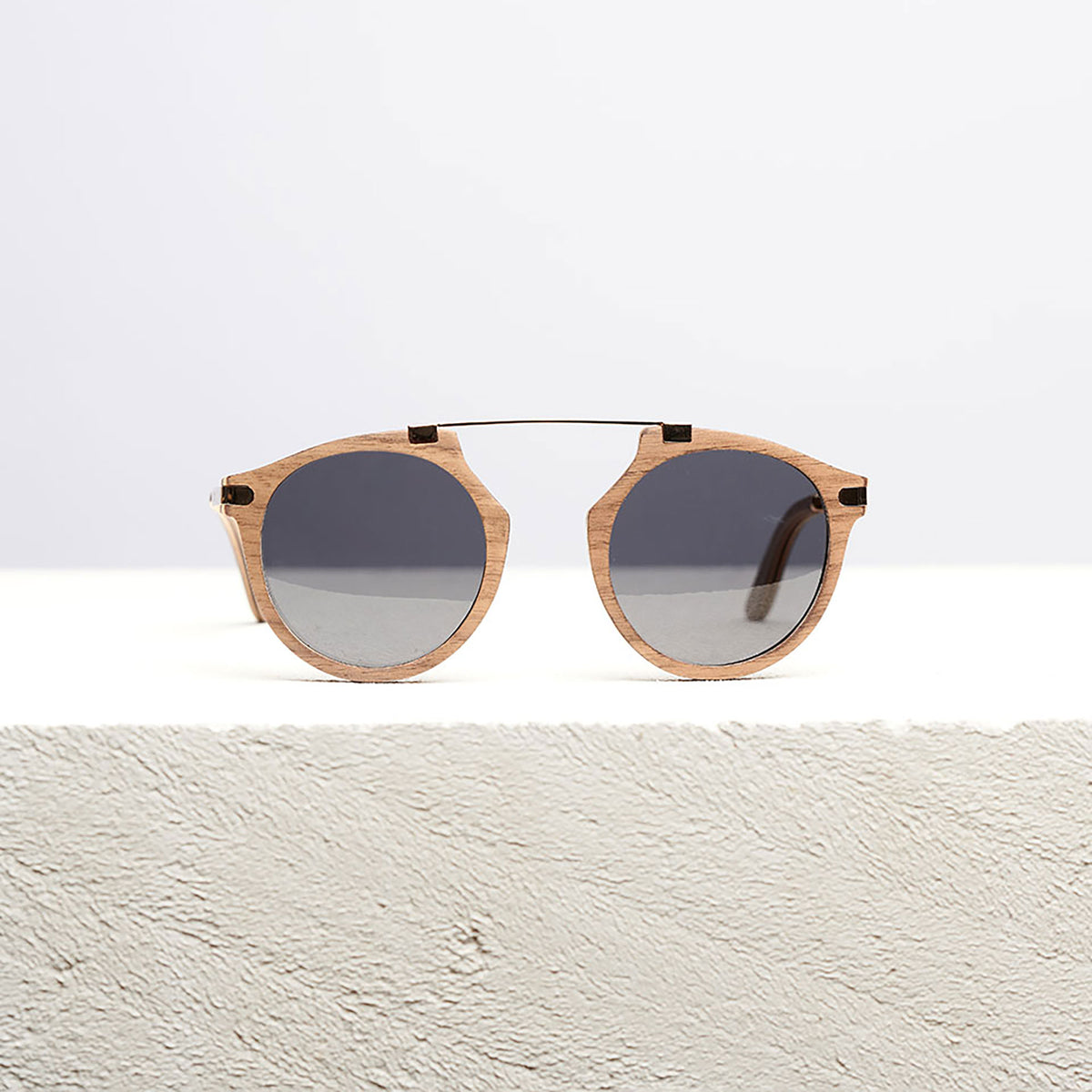 Fuchsia Artemis Santa Monica wooden sunglasses for women with stylish frame and tinted lenses, natural wood finish.