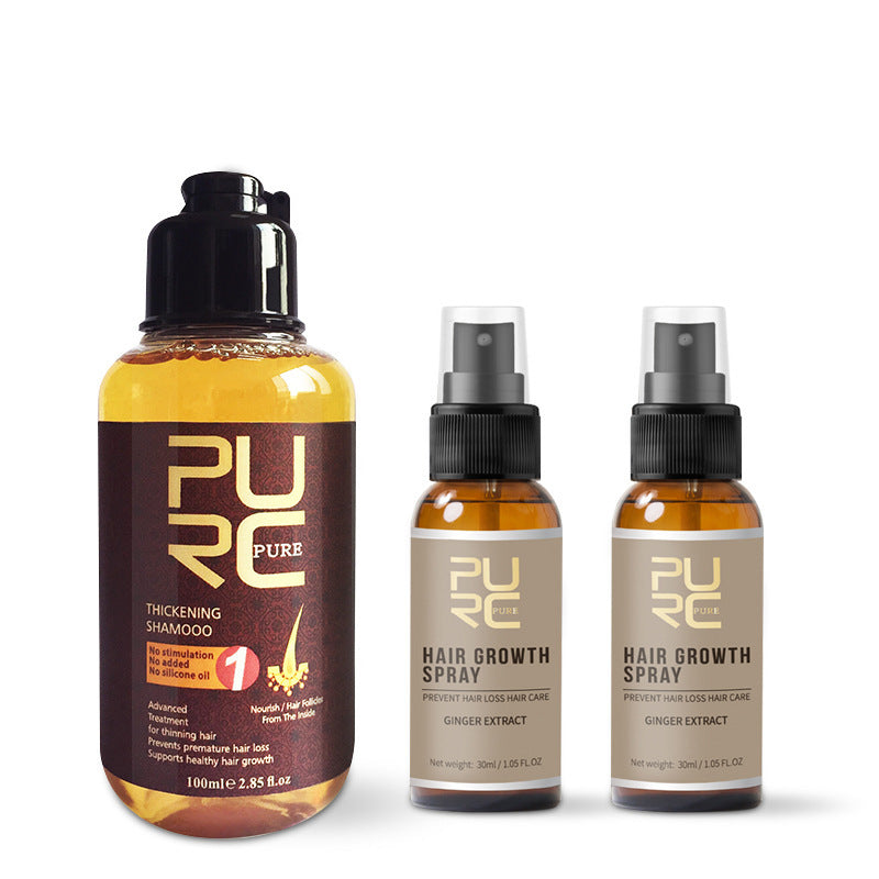 Carmine Juneberry GingerGrow™ Professional Hair Care Kit with shampoo, conditioner, and treatment bottles arranged on a white background.