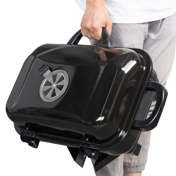 Teal Simba portable charcoal grill and smoker with lid, folding tabletop design for outdoor cooking and barbecues.